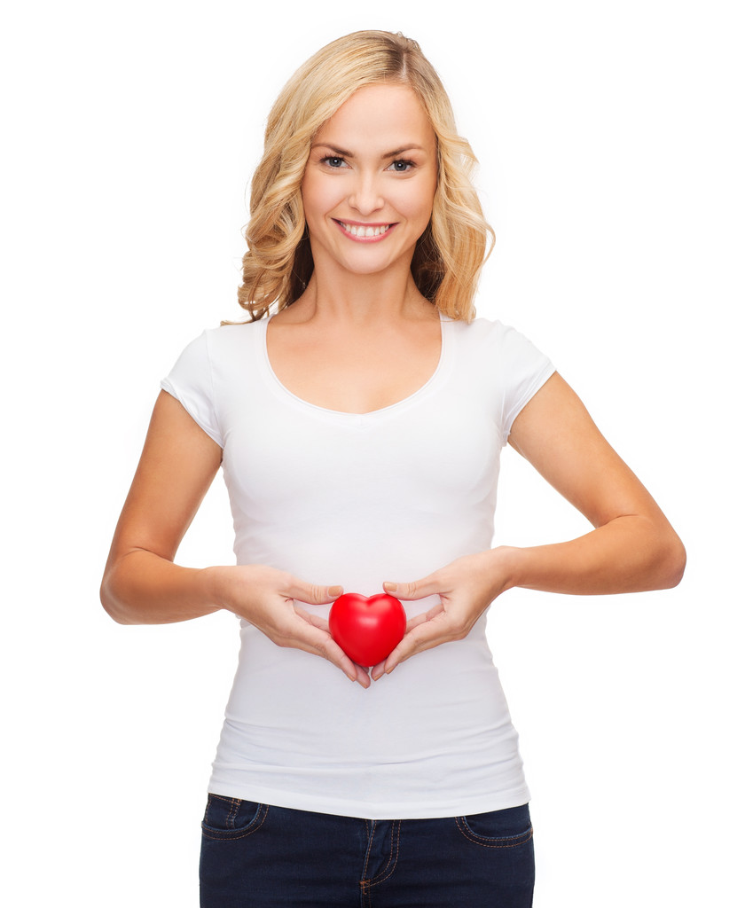 Woman in blank white shirt with small red heart - Photo, Image