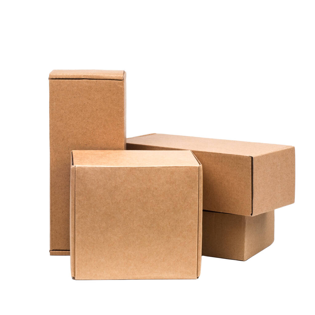 Cardboard boxes for goods on a white background. Different size. Isolated on white background - Photo, Image