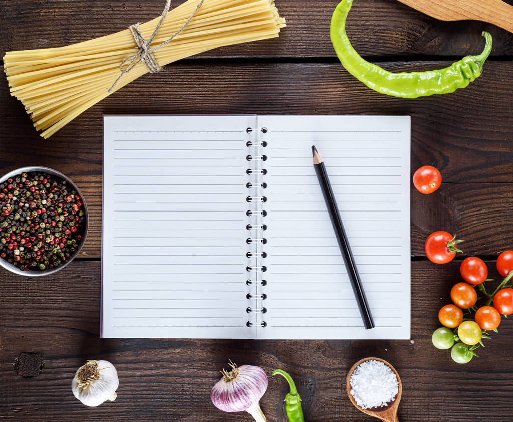 blank notebook with white sheets, raw long paste and ingredients for cooking, top view - Photo, Image