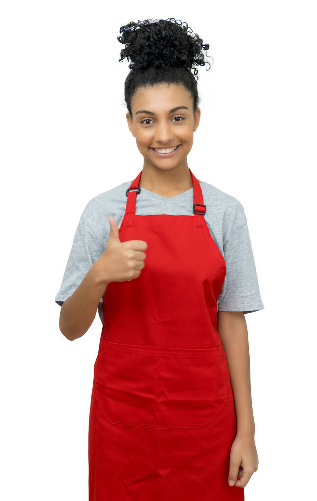 Latinalaisen Amerikan tarjoilija punainen esiliina näyttää peukalo ylöspäin
 - Valokuva, kuva