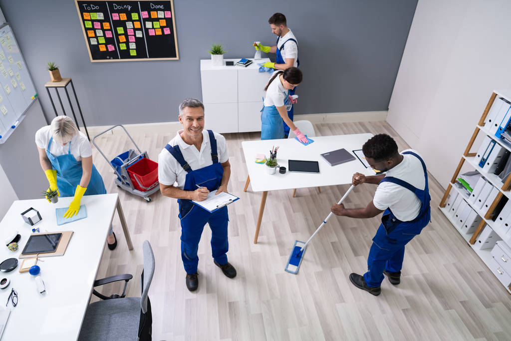 Janitor With His Team Cleaning Modern Office - Photo, Image