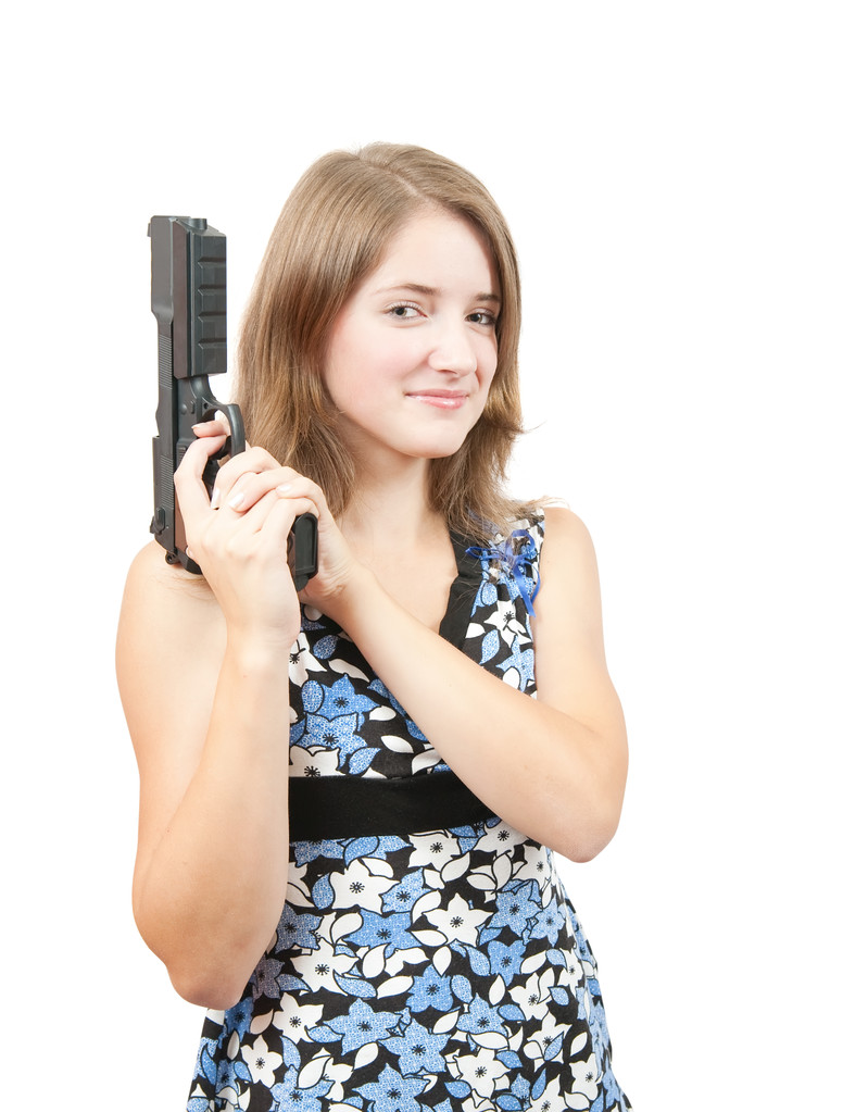 Красива дівчина в синій сукні з пістолетом
 - Фото, зображення