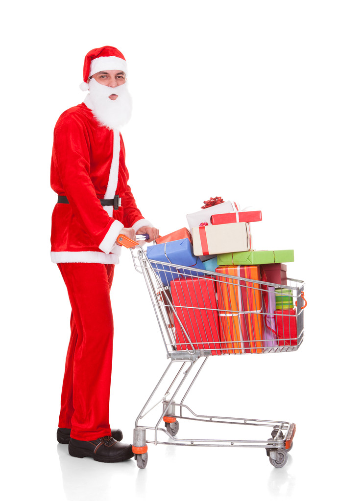Santa sosteniendo carrito de compras
 - Foto, Imagen