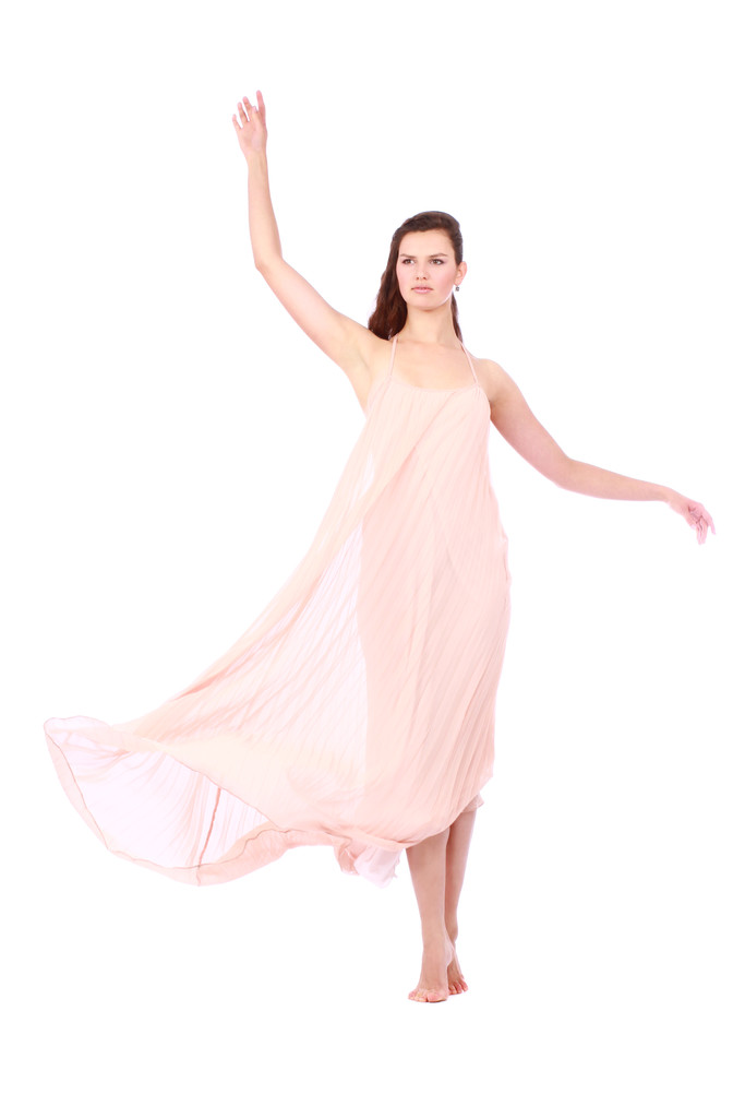 光ピンクのドレスを飛んでで優雅な女の子 - 写真・画像