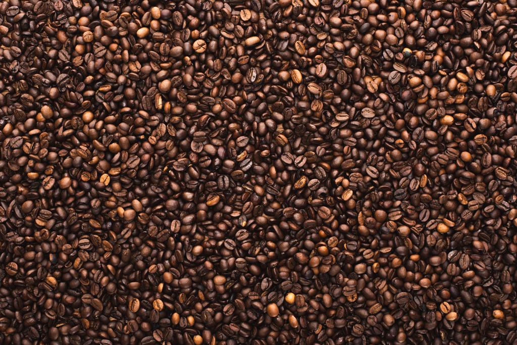 felülnézet friss pörkölt kávébab háttér - Fotó, kép