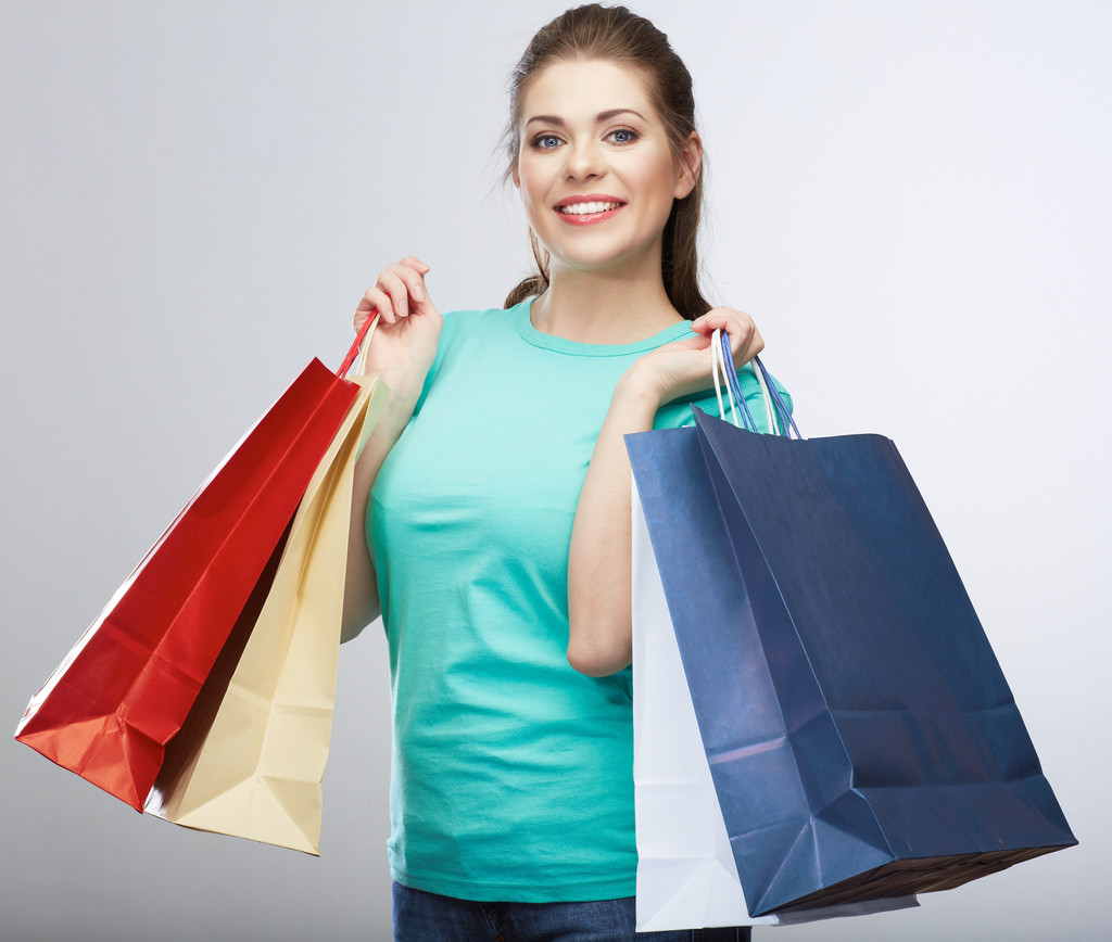 Mujer sosteniendo bolsa de compras
 - Foto, Imagen