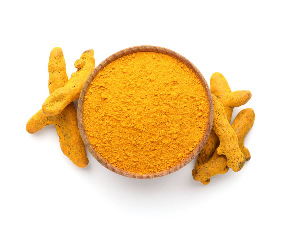 Bowl with aromatic turmeric on white background - Photo, Image