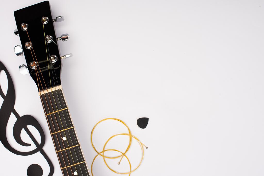 Top View Of Acoustic Guitar And Paper Free Stock Photo and Image