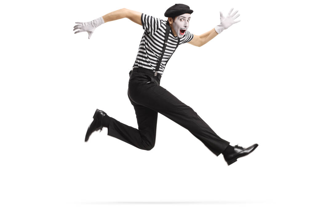 Boldog pantomim jumping elszigetelt fehér háttér - Fotó, kép