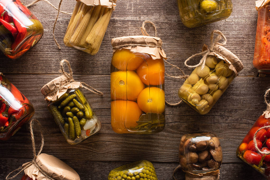 top view of delicious homemade tasty pickles on wooden rustic table - Photo, Image