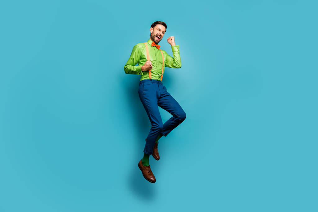 Full length body size view of his he nice attractive funky satisfied cheerful cheery excited guy jumping celebrating isolated on bright vivid shine vibrant blue teal turquoise color background
 - Фото, изображение