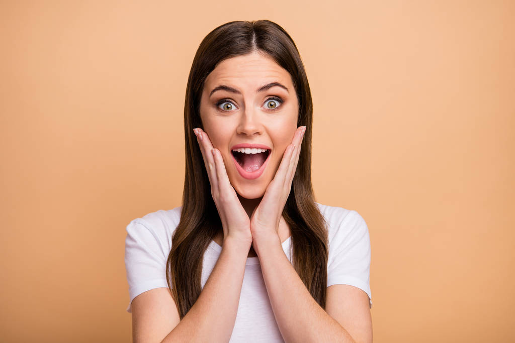 Portrait of astonished crazy girl look incredible black friday bargains impressed touch hands face shout yell wear stylish outfit isolated over pastel color background - Φωτογραφία, εικόνα