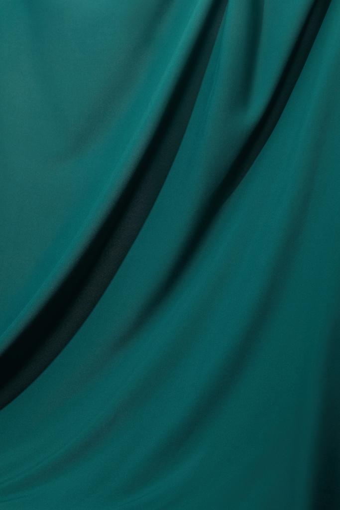 vista de perto de esmeralda tecido de seda macio e ondulado
 - Foto, Imagem