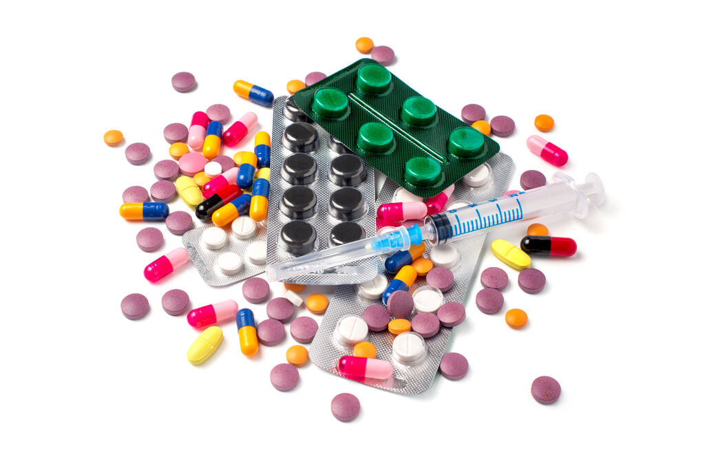 Medicamento multicolore come antibiotici, farmaci, antidolorifici e vitamine isolate su sfondo bianco
 - Foto, immagini