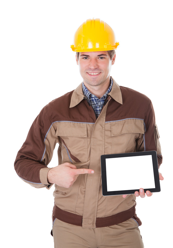 építőipari munkás gazdaság digitális tabletta - Fotó, kép