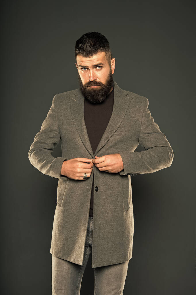 Classy but modern. Fashion outfit. Masculine look. Brutal hipster man. Hipster wearing casual clothes. Hipster beard and stylish haircut. Bearded man trendy hipster style. Monochrome style outfit - Photo, Image