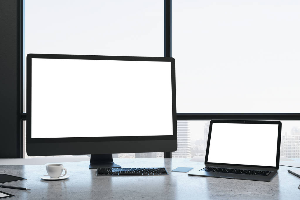 Coworking intérieur de la salle de bureau avec vue sur la ville, ordinateur et ordinateur portable avec écran blanc, la lumière du jour et de l'équipement. Rendu 3D
 - Photo, image