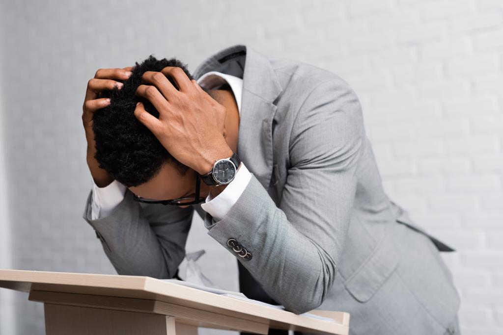 exhausted african american speaker on business conference in office - Photo, Image