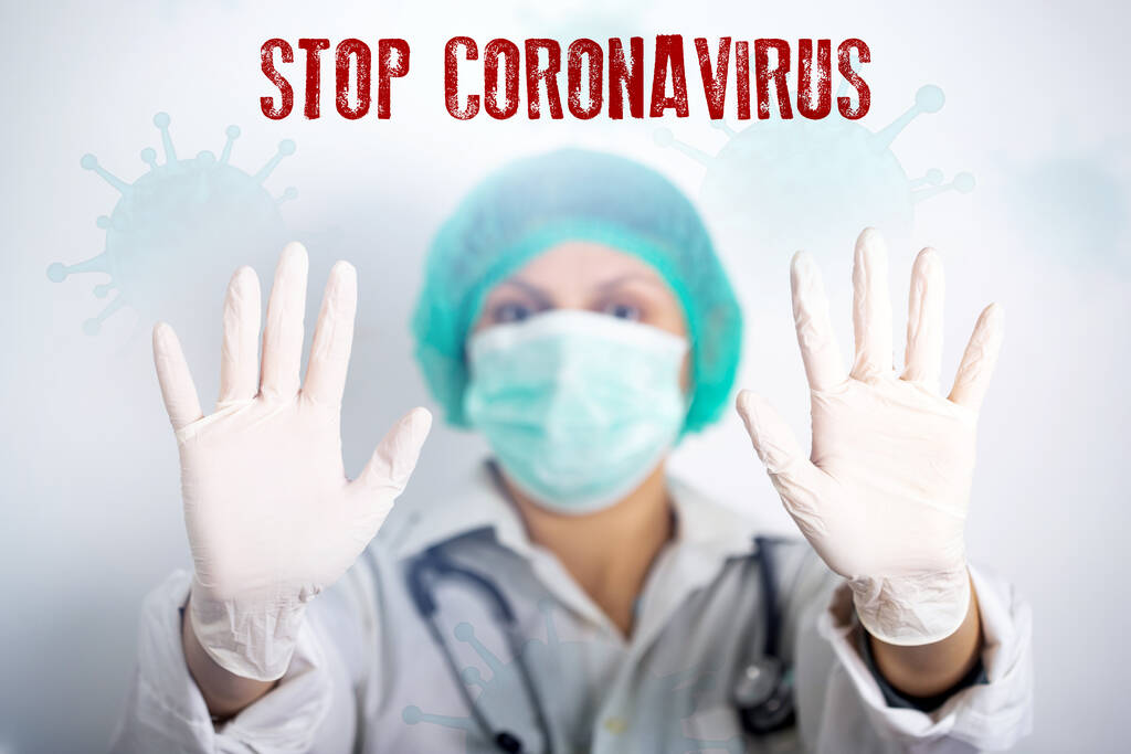Az orvos küzd a koronavírus ellen. Coronavirus betegség - 2019-ncov. Járvány az egész világon, veszélyes vírus, baktérium koncepció. - Fotó, kép