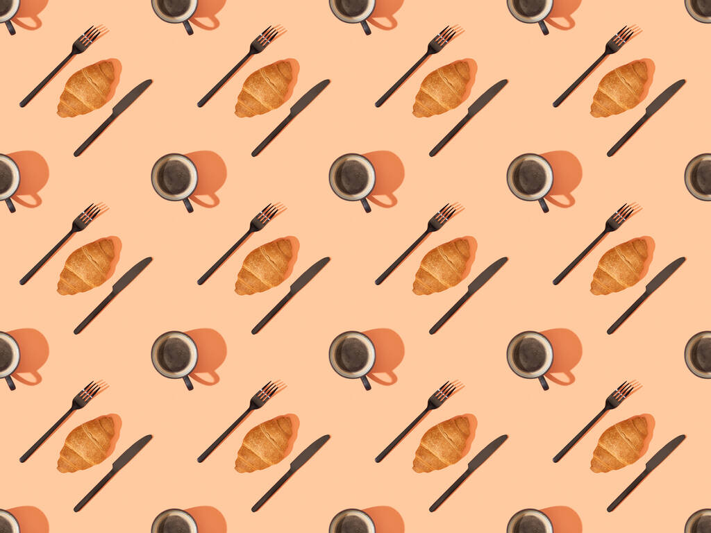 vue de dessus des couverts, croissants frais et café sur orange, motif de fond sans couture
 - Photo, image