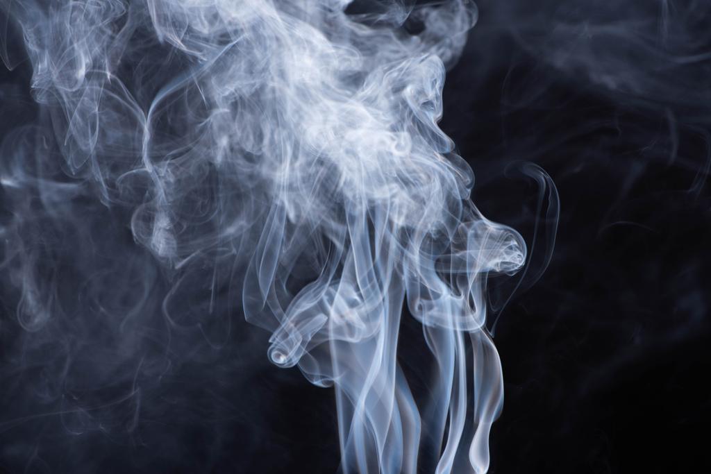 Abstract White Flowing Smoke On Black Background Free Stock Photo and Image