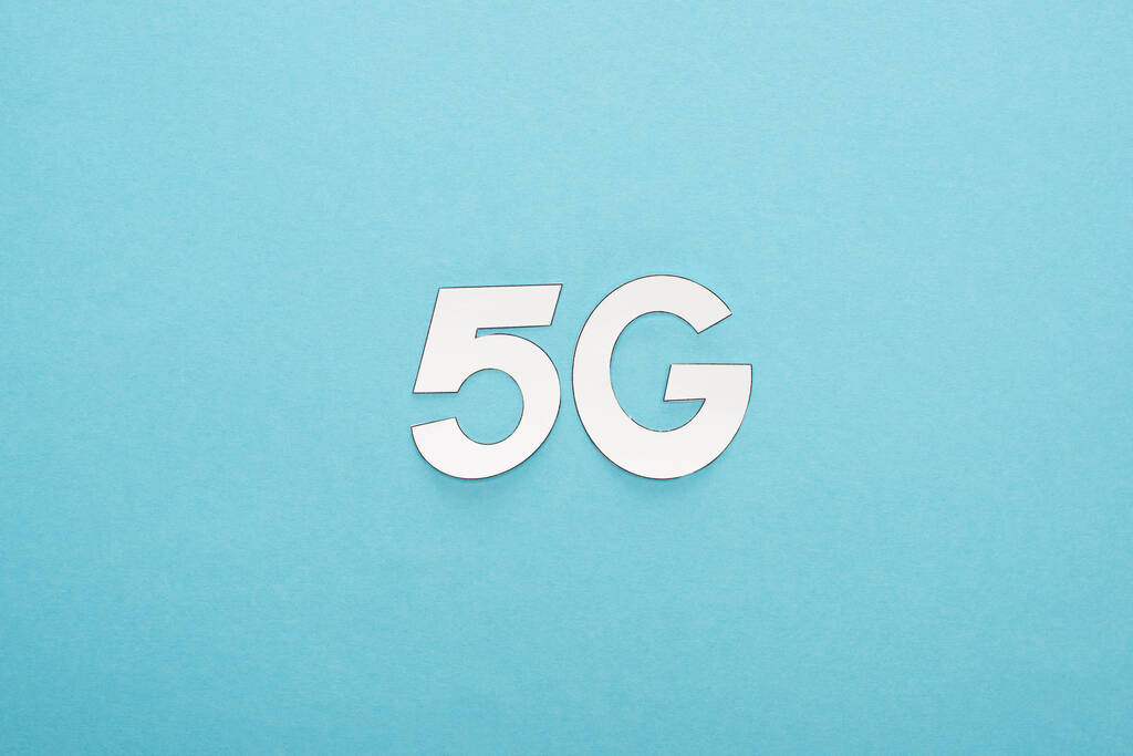 top view of white 5g lettering on blue background - Photo, Image
