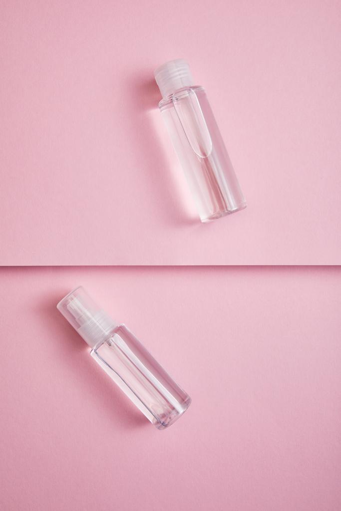 Vue du dessus du vaporisateur de désinfectant transparent et du flacon de lotion avec liquide sur fond rose
 - Photo, image