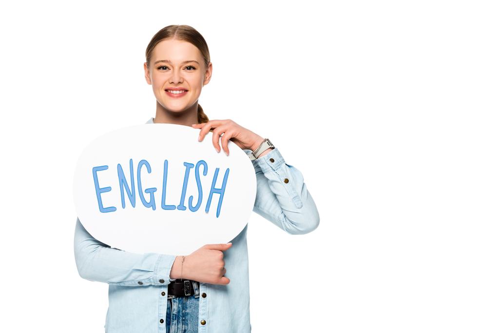 smiling girl with braid holding speech bubble with English lettering isolated on white - Photo, Image
