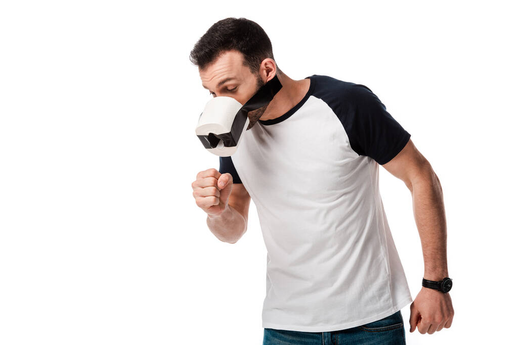 Kranker Mann mit Klebeband und Toilettenpapier im Gesicht hustet isoliert auf weißem Grund  - Foto, Bild
