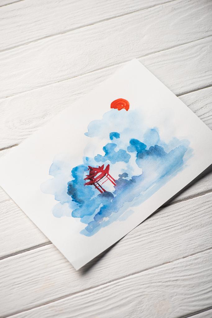 Magas szög kilátás papír japán festészet templommal fa felületen - Fotó, kép