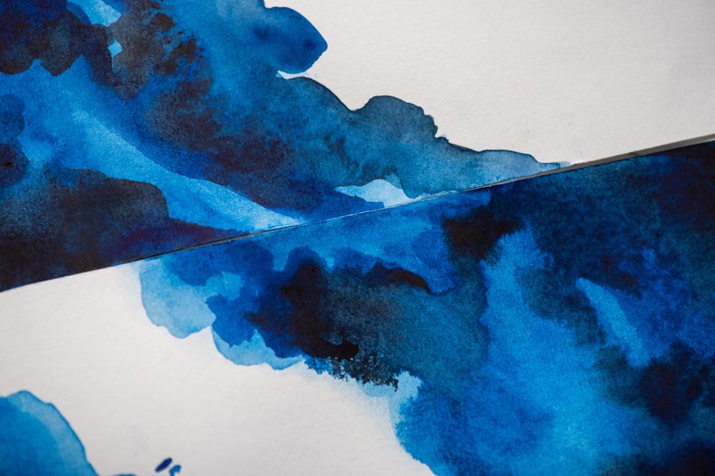 High angle view of paper with japanese painting with bright blue watercolor - Photo, Image