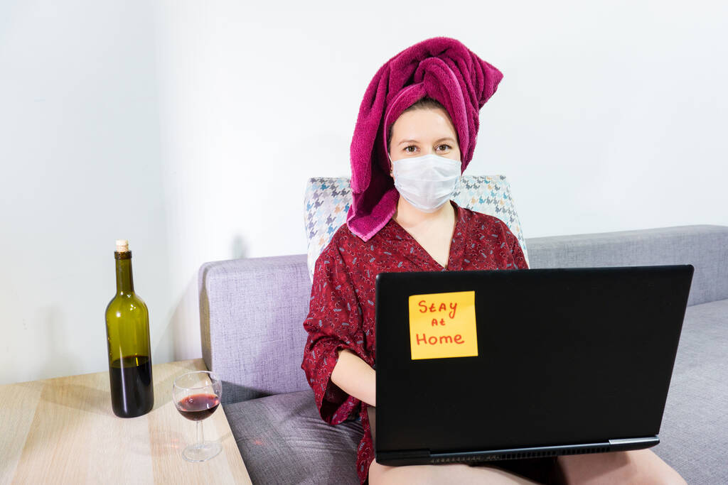 girl is working laptop from home room during Coronavirus or Covid-19 quarantine, coronavirus covid 19 infected patient. - Photo, Image