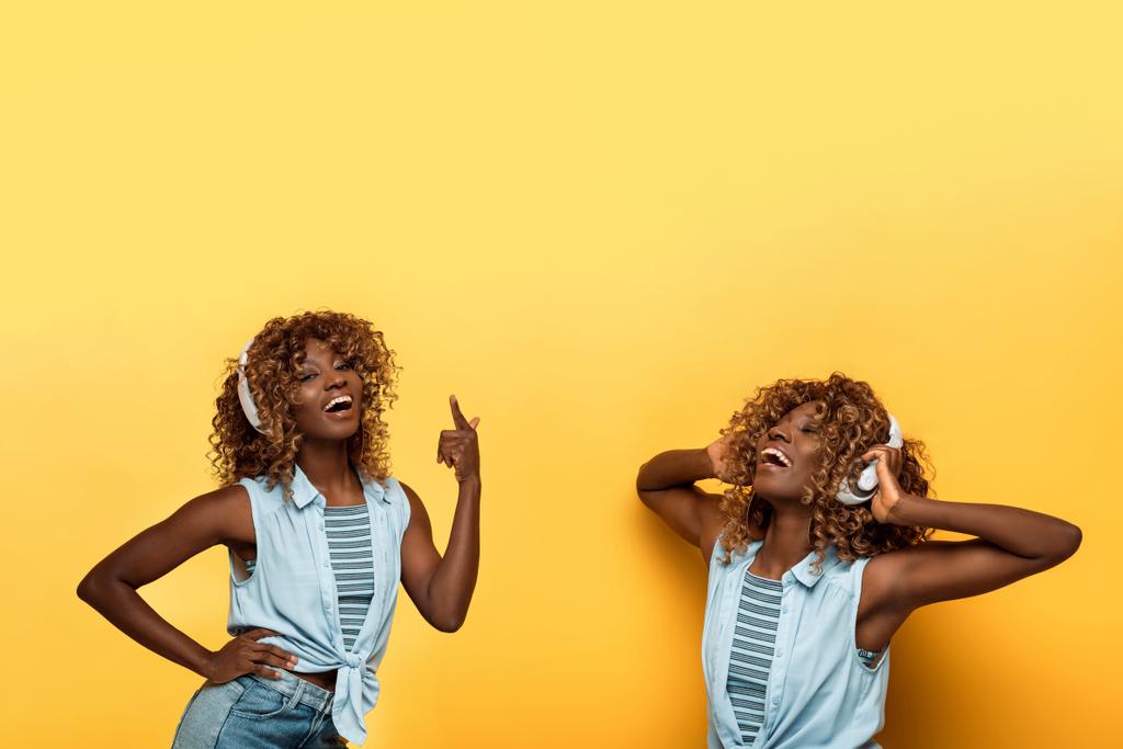 collage of happy african american woman listening music in headphones on yellow background - Photo, Image