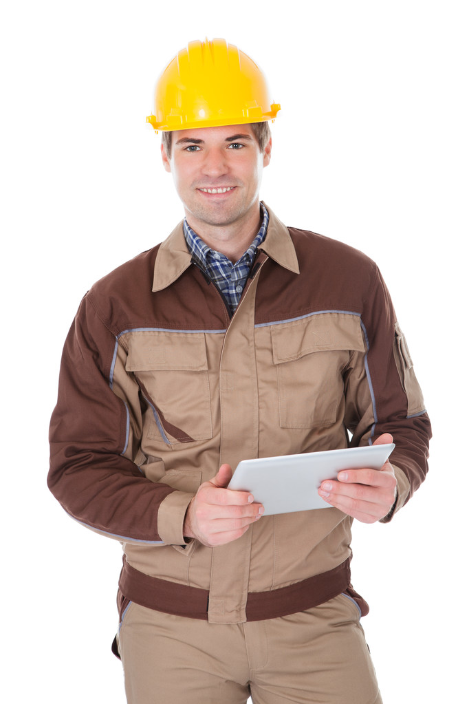 Trabajador de la construcción que sostiene la tableta digital
 - Foto, Imagen