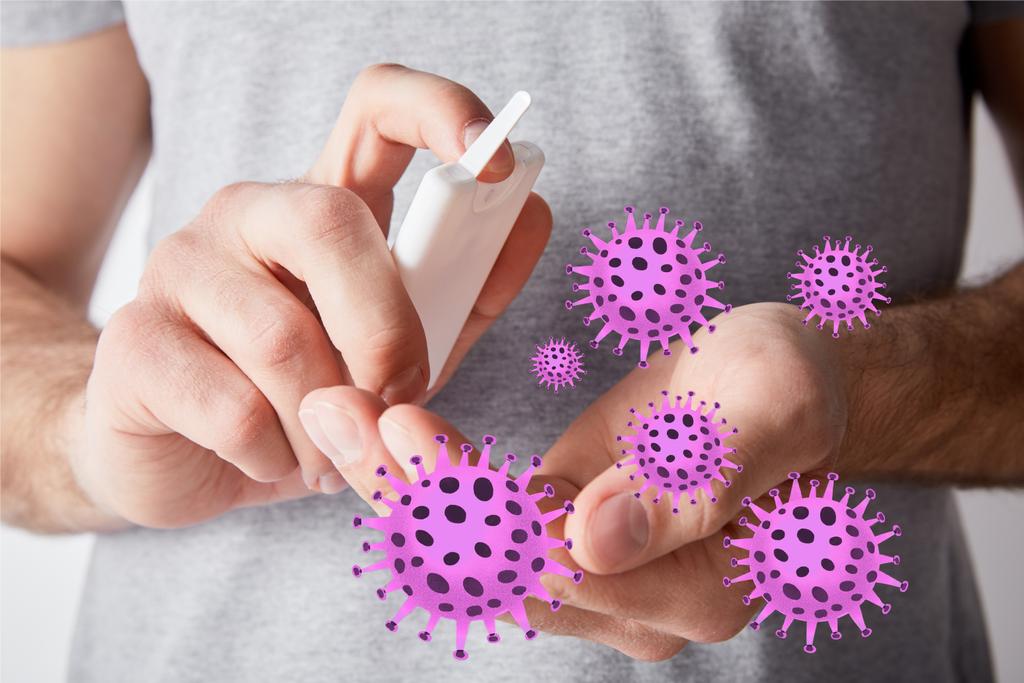 vista recortada del hombre adulto usando desinfectante de manos, ilustración de bacterias
 - Foto, Imagen