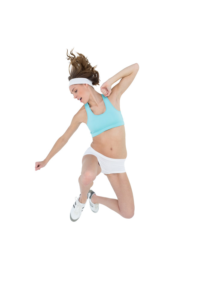 Esbelta mulher desportiva vestindo sportswear jumping
 - Foto, Imagem