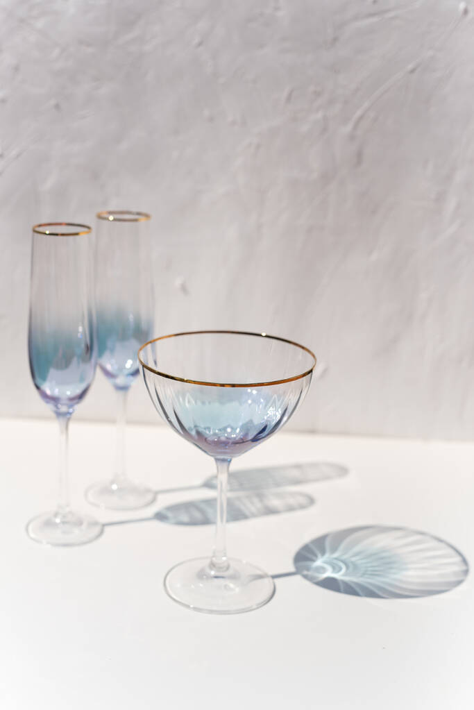 blue transparent cava glass set with sun light reflections - Photo, Image