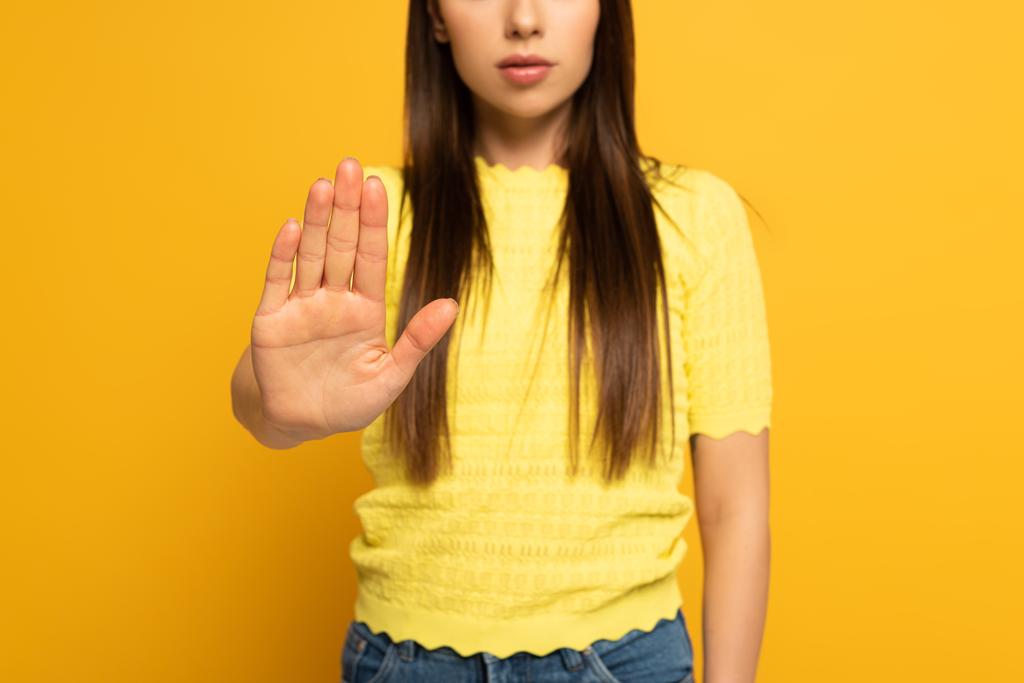 Cropped view of woman showing no sign on yellow background - Photo, Image