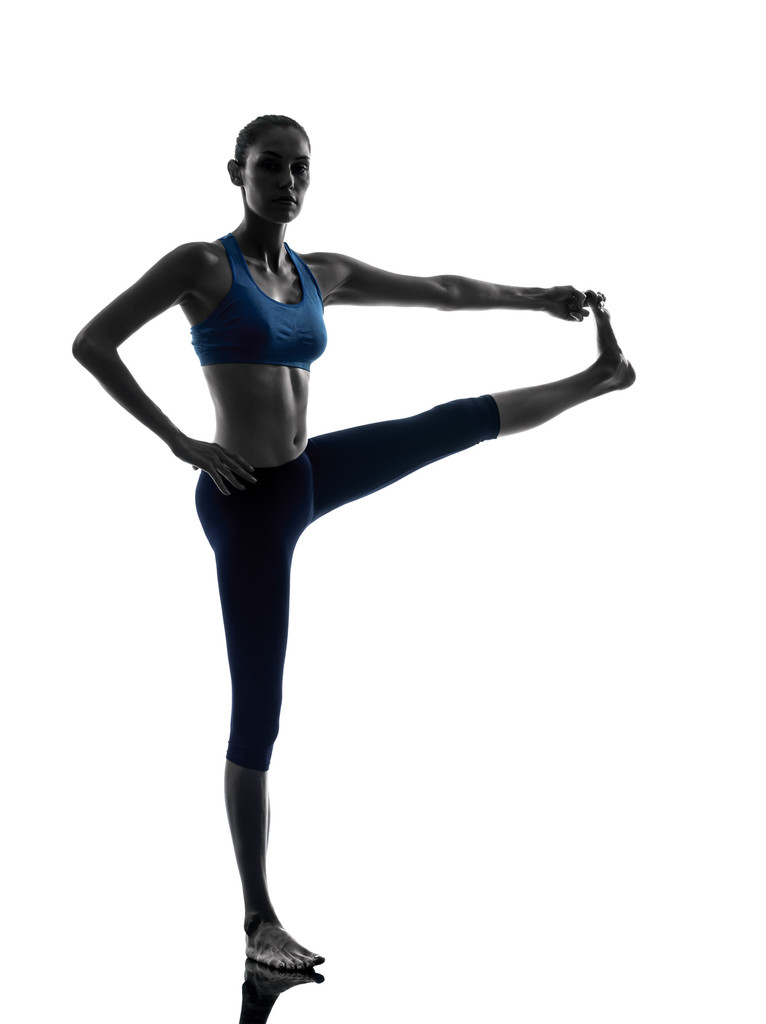 жінка фізичних вправ йоги hasta padangusthasana силует - Фото, зображення