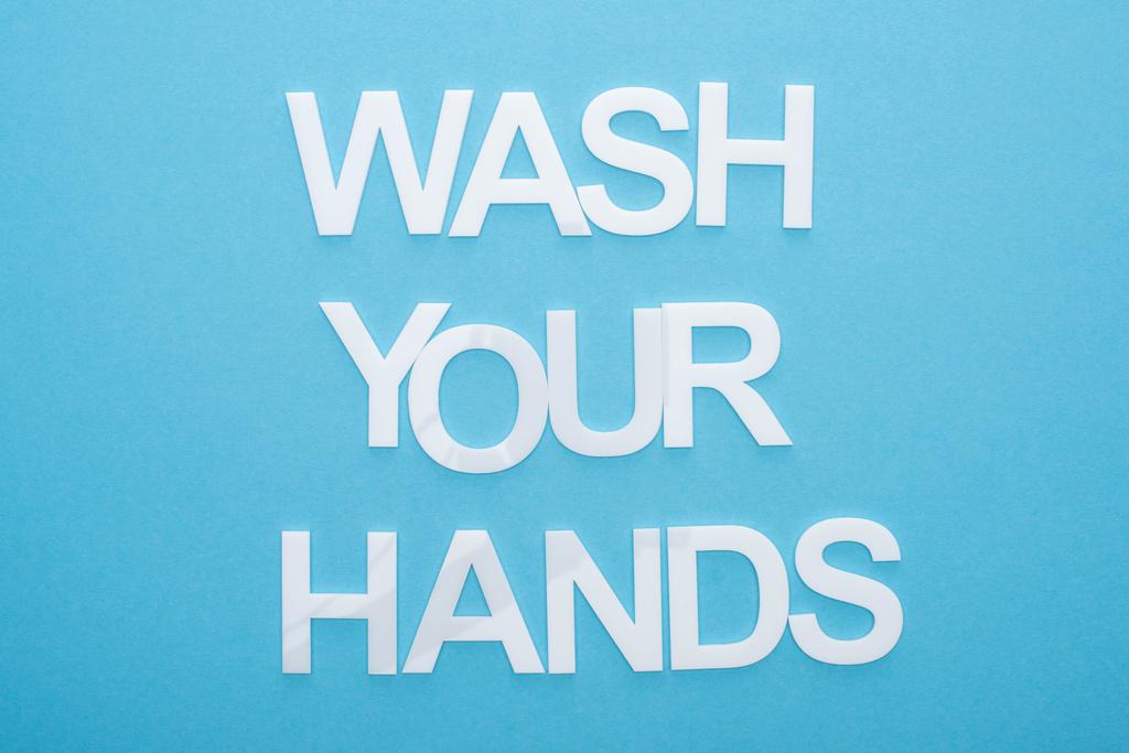 верхний вид мыть руки буквы на синем фоне
 - Фото, изображение
