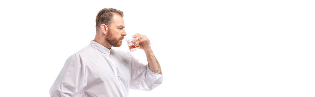 Scottish redhead man drinking whiskey from glass isolated on white, panoramic crop - Photo, Image