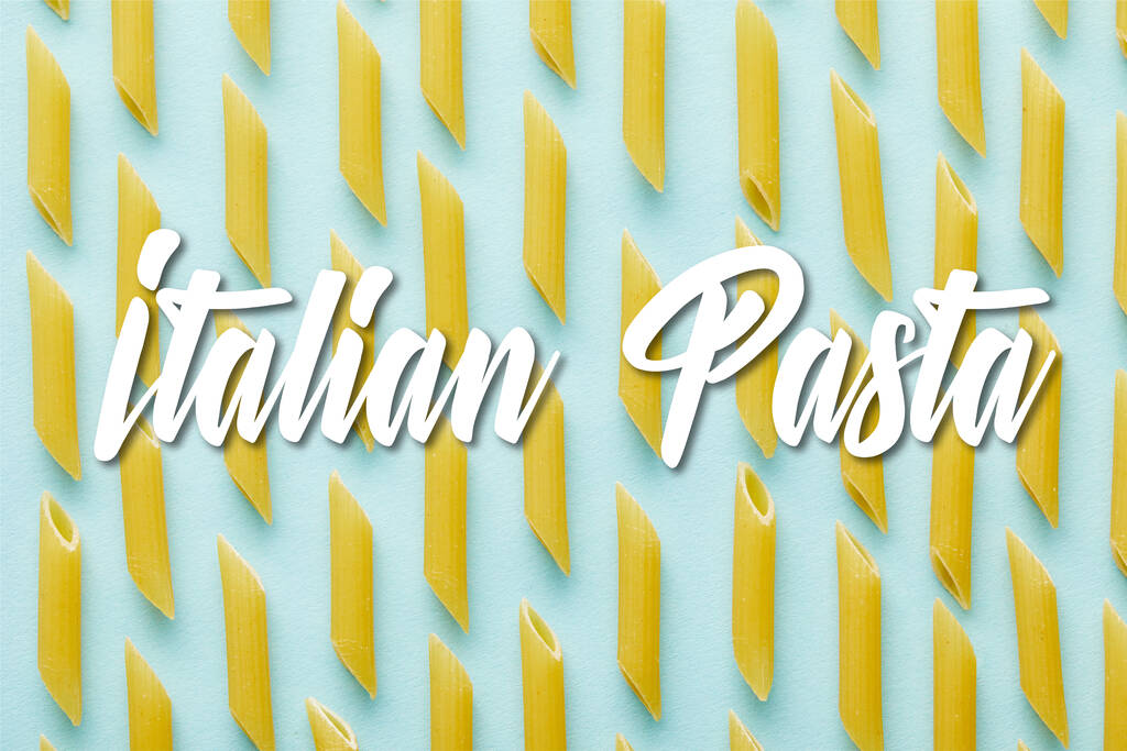 flat lay with raw penne on blue background with Italian pasta illustration - Photo, Image