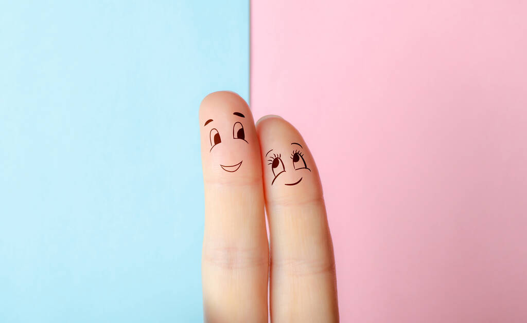 le concept de deux doigts comme un homme et une femme s'embrassent et s'aiment
 - Photo, image