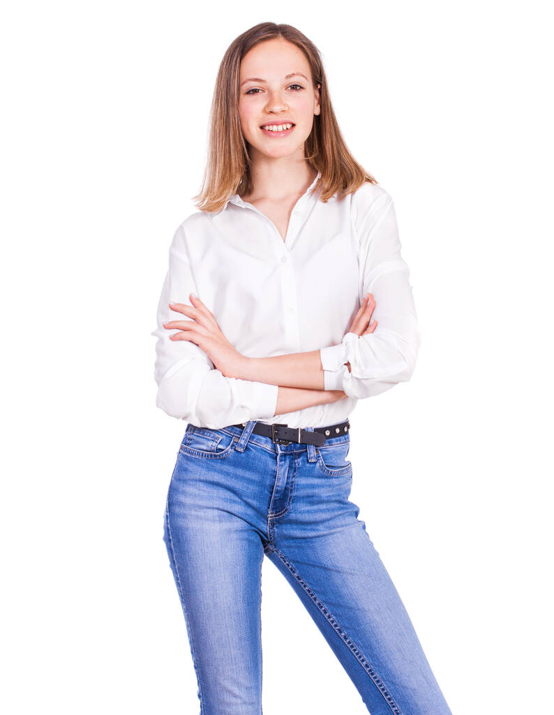 Nahaufnahme Porträt eines jungen schönen blonden Modells in blauen Jeans und weißem Hemd, isoliert auf weißem Hintergrund - Foto, Bild