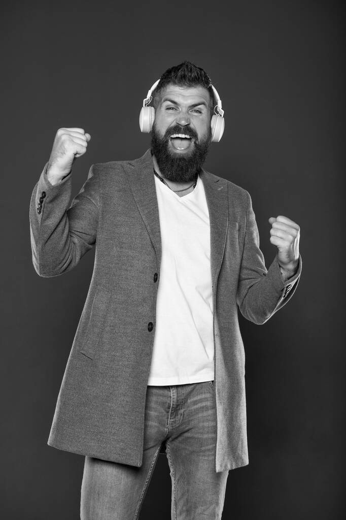 Hear my voice. Bearded man enjoy singing to vocal melody. Happy hipster do vocal on song grey background. Training vocal skills. Vocal singing. Music and karaoke. Lets sing - Photo, Image