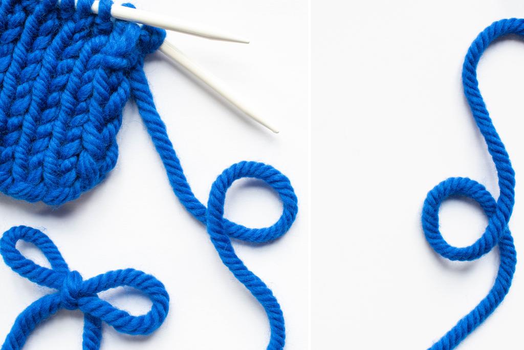 fios de lã azul e agulhas de tricô sobre fundo branco
 - Foto, Imagem