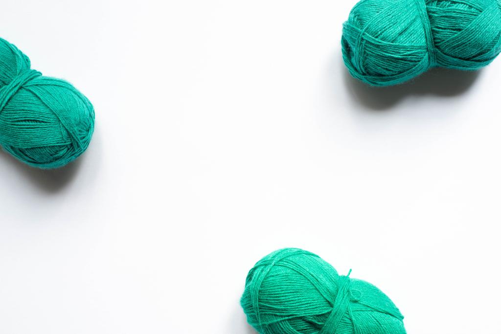 top view of green wool yarn on white background - Photo, Image