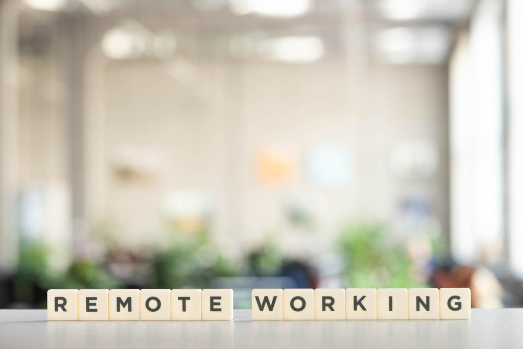 white cubes with remote working lettering on white desk - Photo, Image