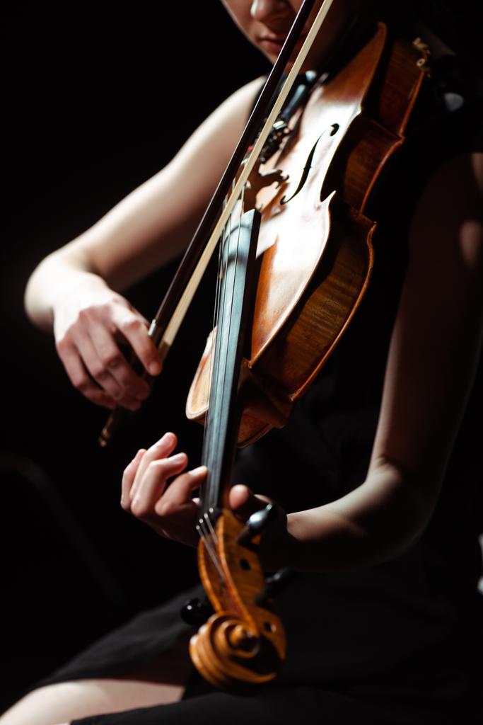 partial view of musician playing symphony on violin isolated on black - Photo, Image