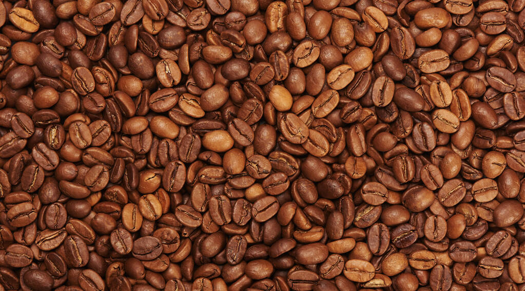 Roasted coffee beans background top view - Photo, Image